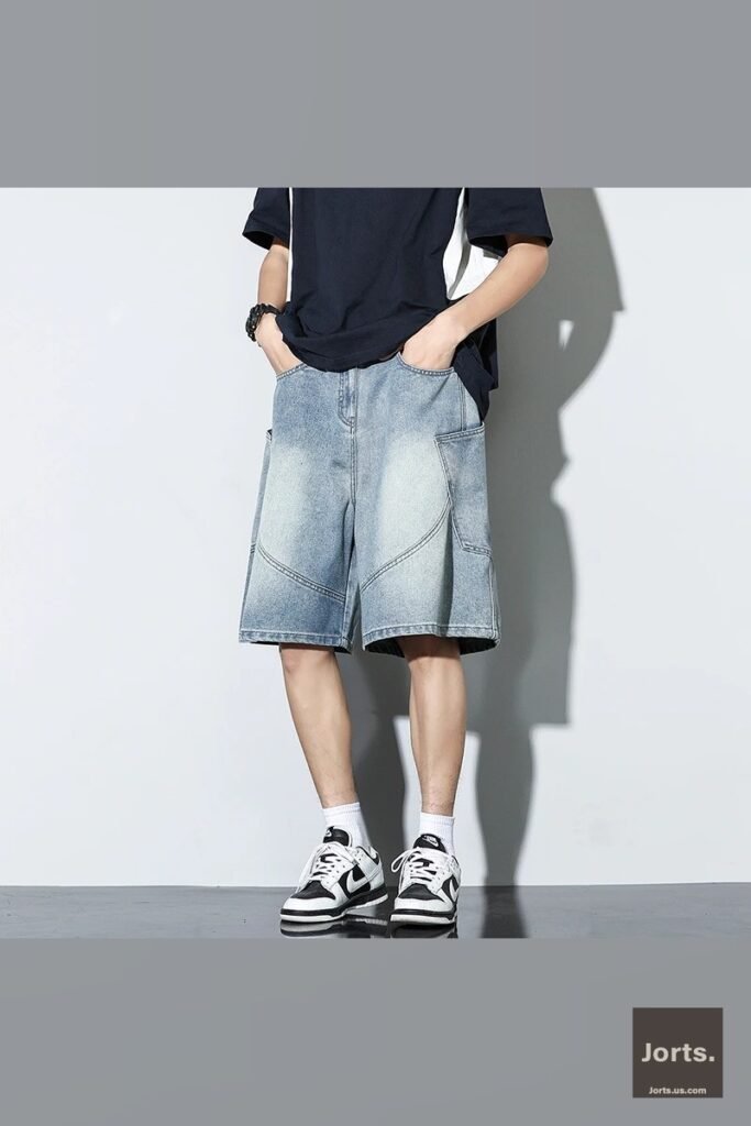 Size chart for vintage wash baggy denim shorts, displaying waistline, hips, leg opening, and length measurements.