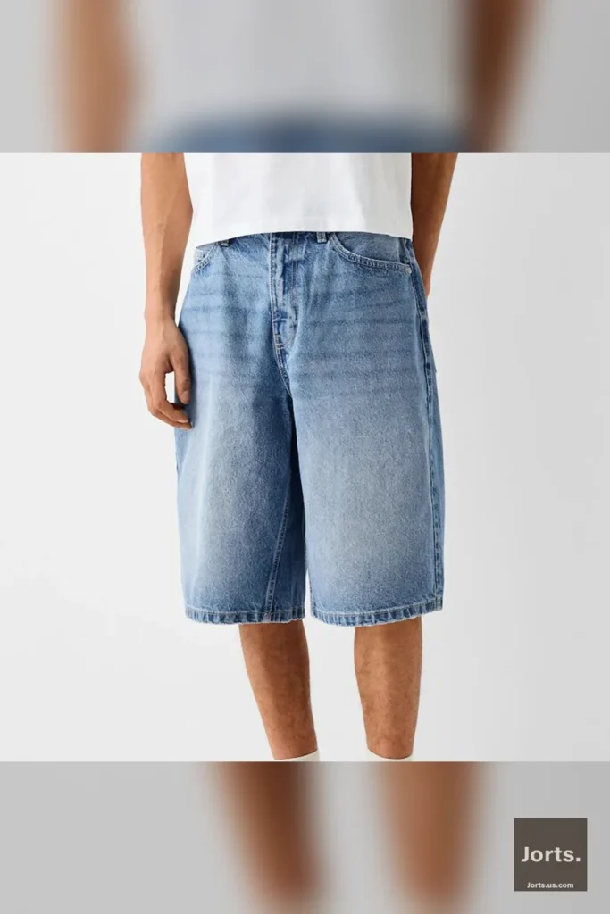 Side profile of men's loose fit denim jorts, perfect for a vintage streetwear look